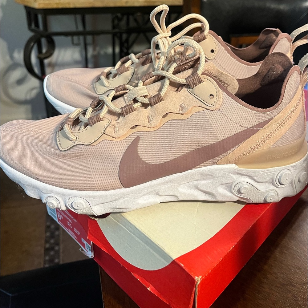 Pink Nike running shoes
